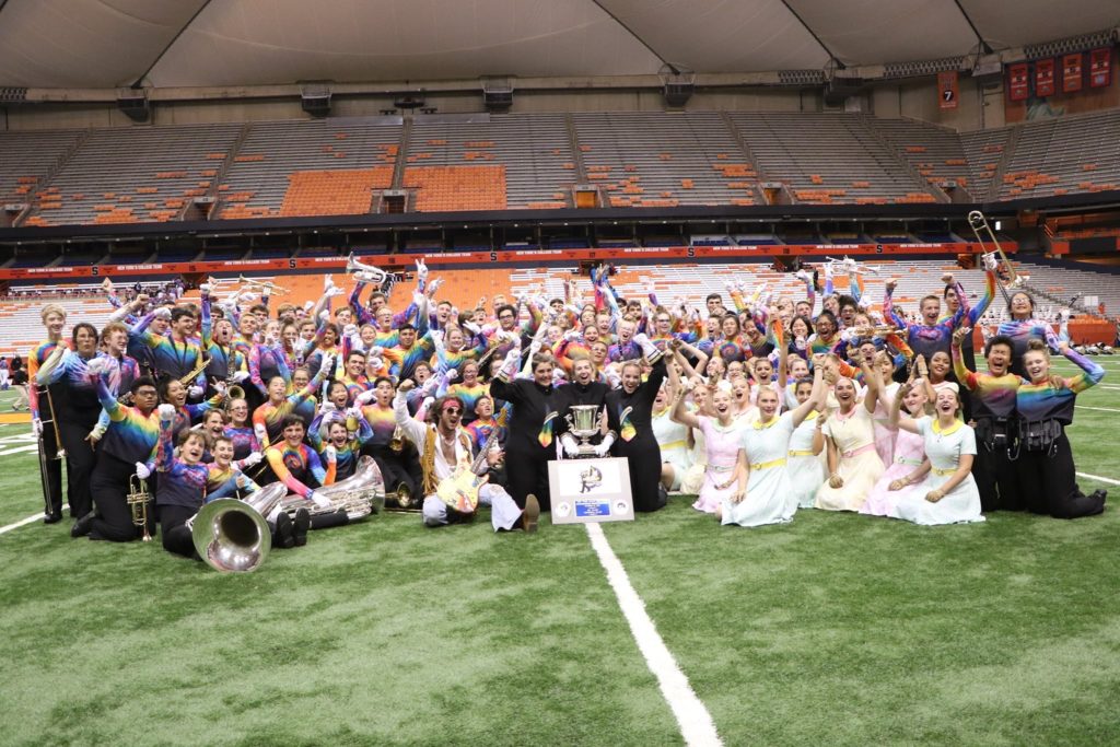 Championship photo of the Arlington High School Marching Band after they won their 4th consecutive championship.